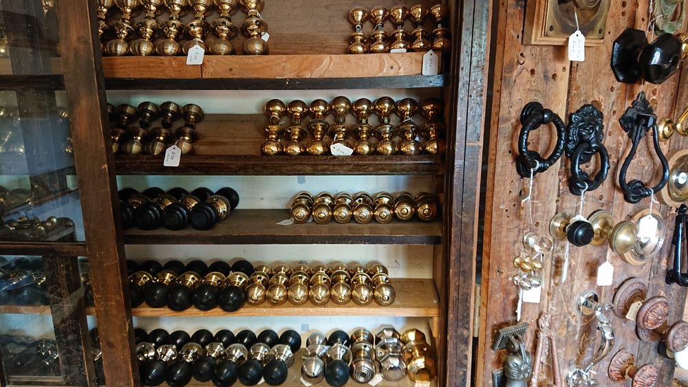 <p>Brass and ebonised wood door handles