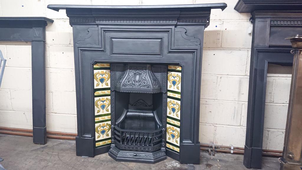<p>Large original Victorian combination fireplace with original art noveau tiles