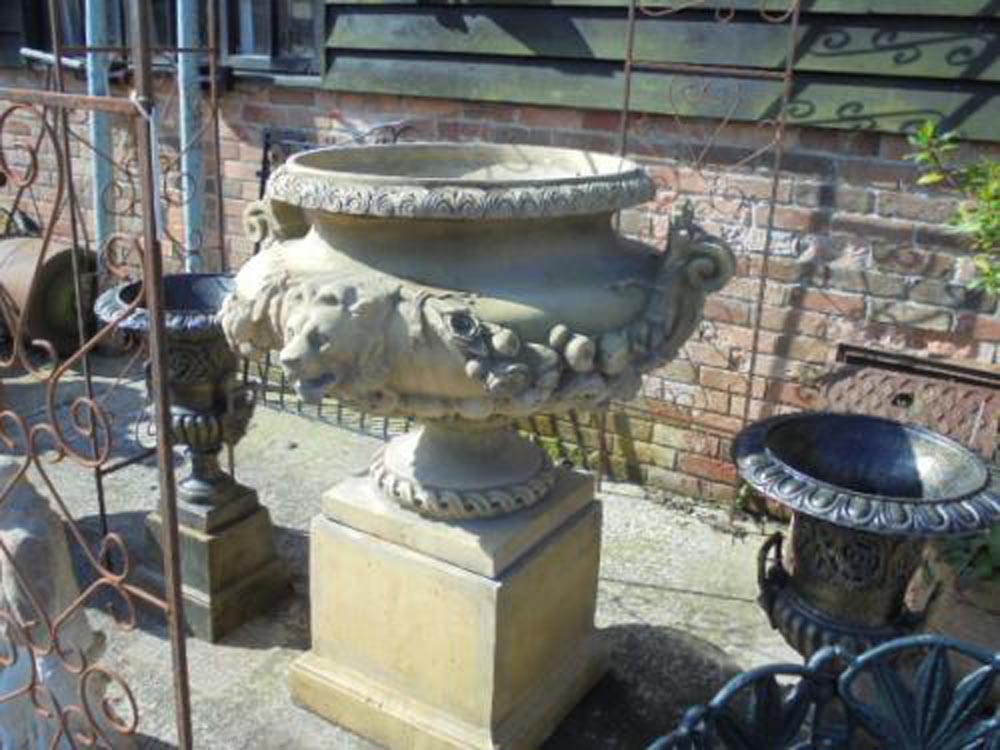 French Lion Mask Urn on Plinth