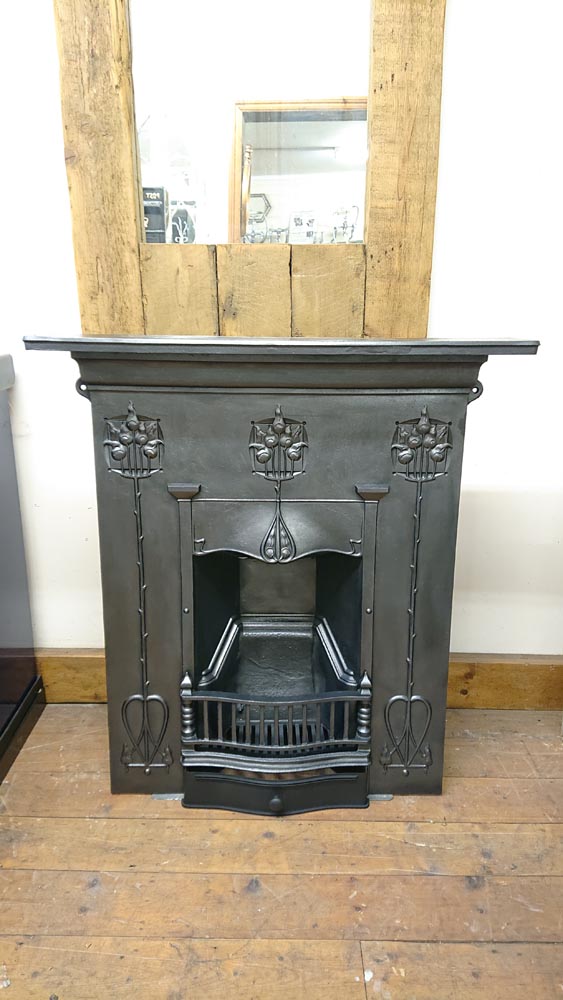 <p>Early 20th century Art Nouveau combination fireplace.
