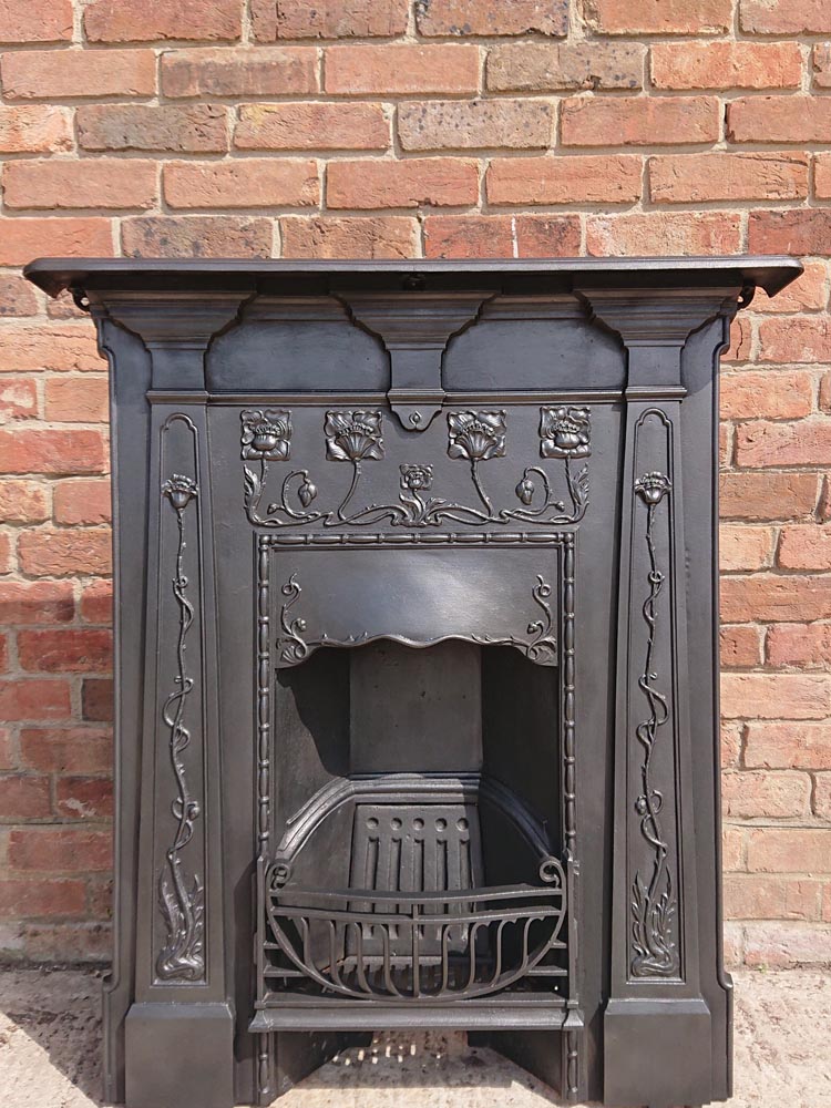 <p>Original cast iron Art Nuovo with floral details</p><p>Lounge combination fireplace