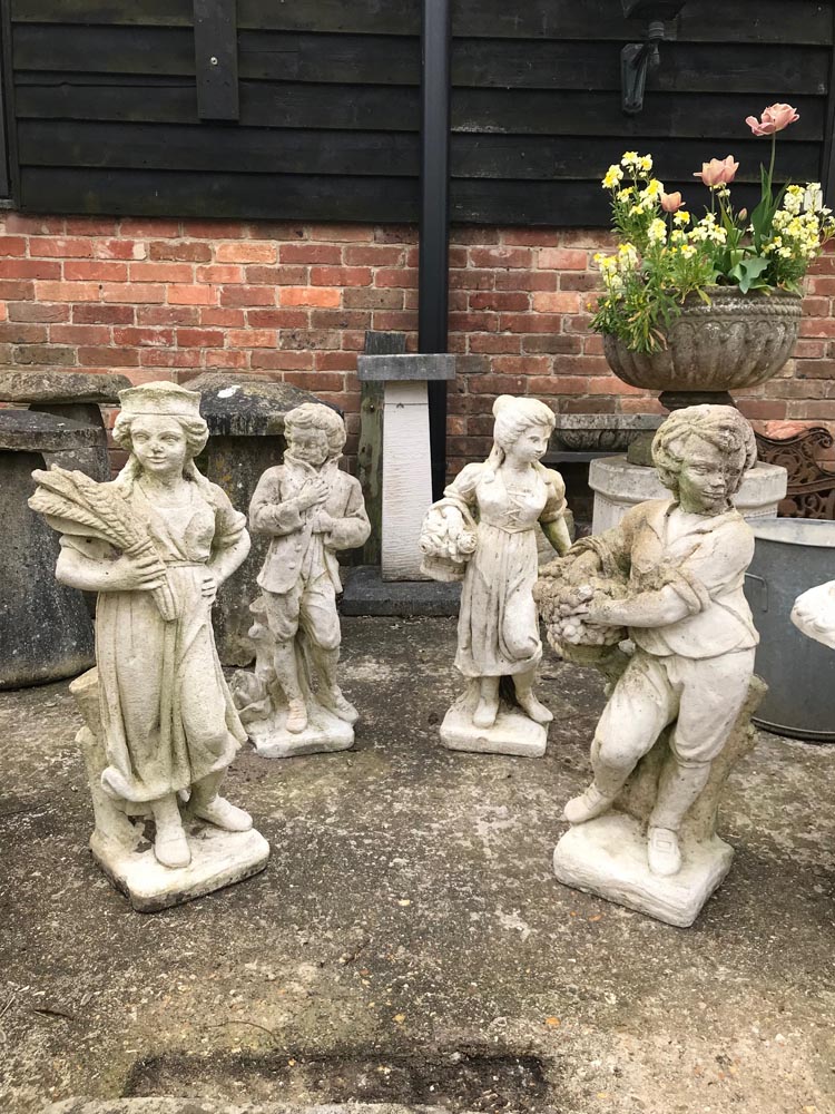 <p>Set of four season weathered statues