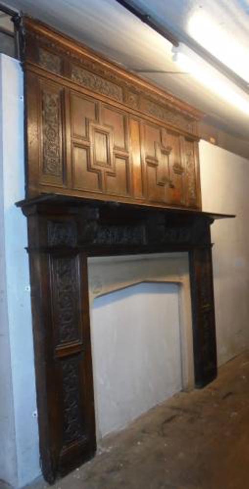 <p>Genuine and extremely rare<br>Jacobean oak chimney piece with <br>stone surround opening</p><p>187 cm wide x 243 cm high. Mantle 200 cm</p><p>122 cm wide x 115 cm high Internal dimensions</p>