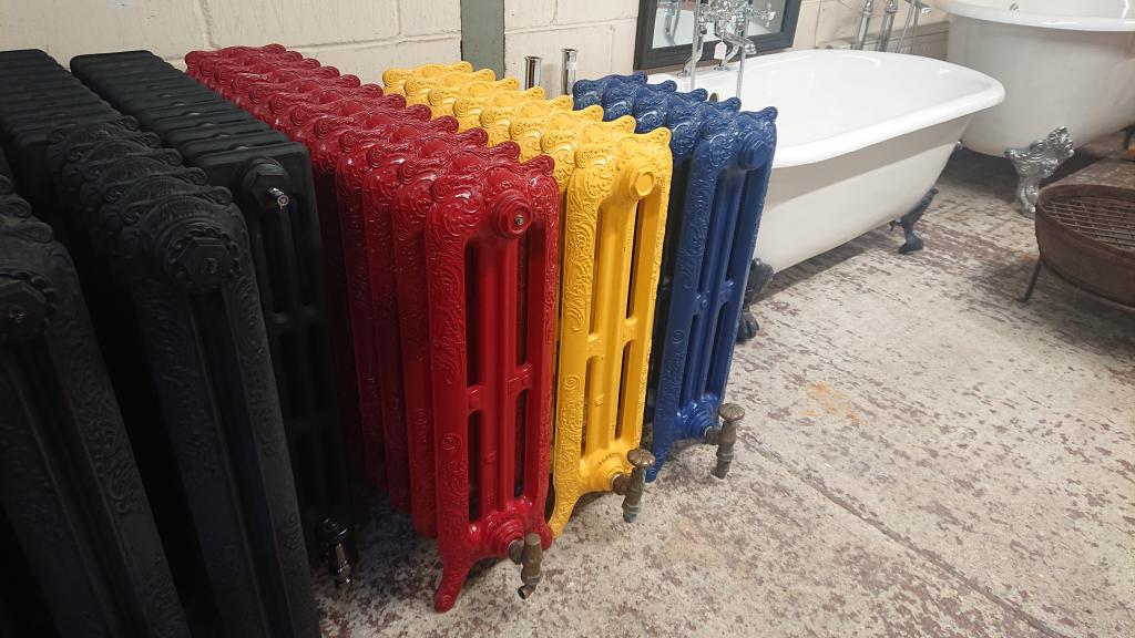 <p>Three brightly coloured decorative radiators