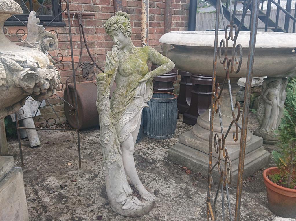 <p>Weathered lady with flower